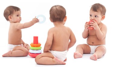 Three babies play on the floor. Montage. clipart