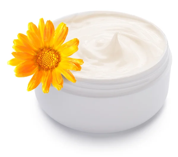 Jar of cream and calendula flower. — Stock Photo, Image