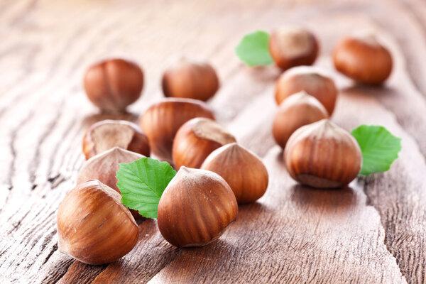 Filberts on a wooden table. Close-up shot.