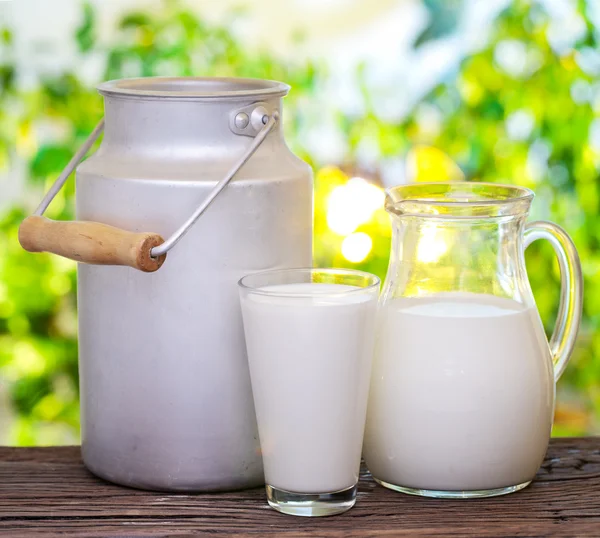 Milk in various dishes. — Stock Photo, Image