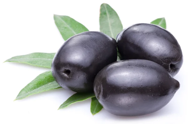 Three large ripe black olives. — Stock Photo, Image