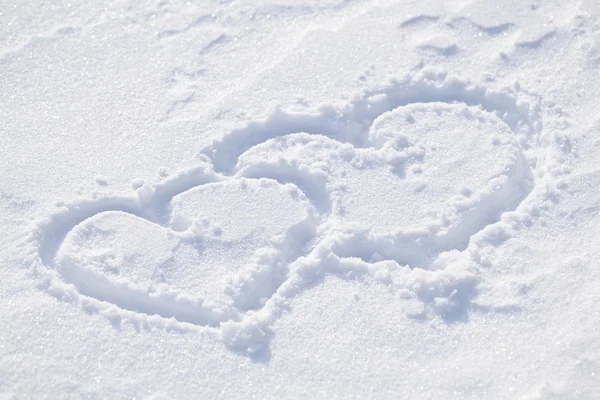 A forma do coração na neve . — Fotografia de Stock