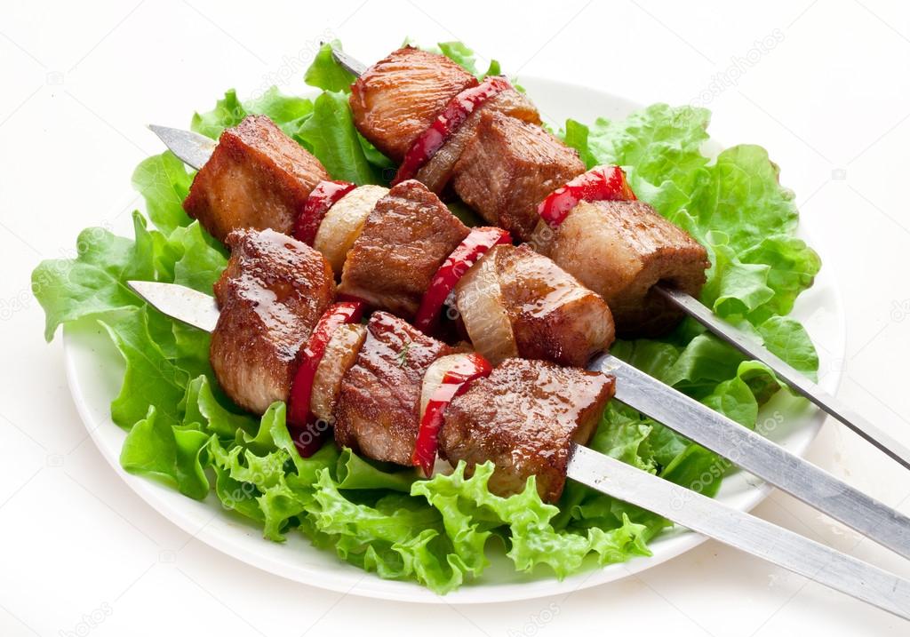 Grilled kebab (shashlik) on spits.