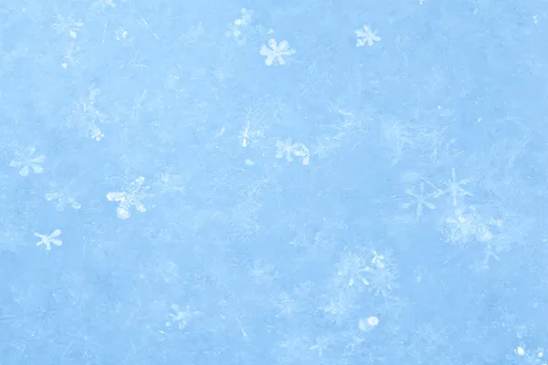 Синий сверкающий снежный фон . — стоковое фото