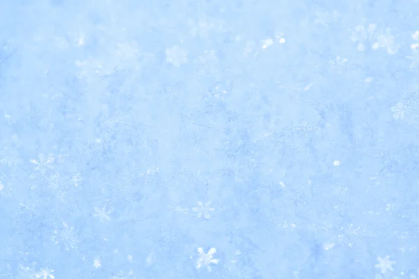 Blau funkelnder Schnee Hintergrund. — Stockfoto