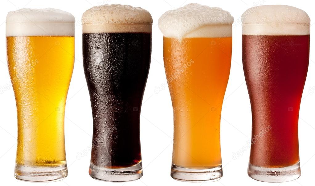 Four glasses with different beers