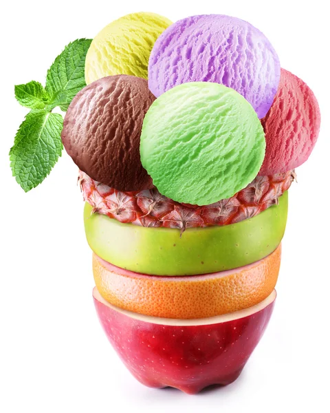 Ice-cream scoops in fruity glass. — Stock Photo, Image