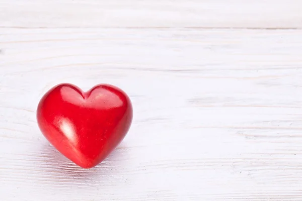 Valentines Day. Red heart on a wooden table. Royalty Free Stock Images