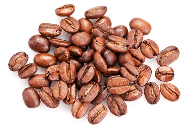 Roasted coffee beans and leaves. — Stock Photo, Image