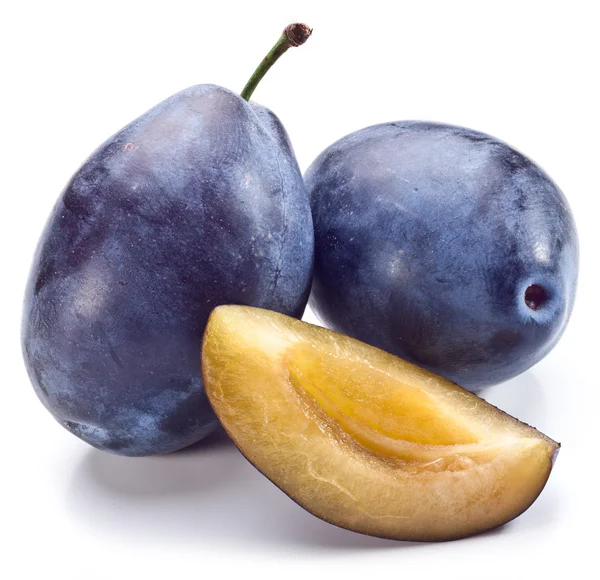 Plums with plum slice. — Stock Photo, Image