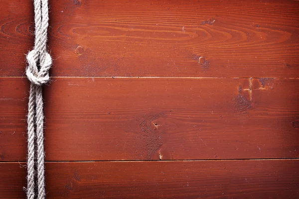 Nudo de marinero sobre fondo de madera viejo . — Foto de Stock