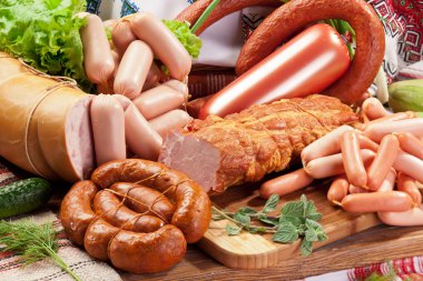 Variety of sausage products. clipart