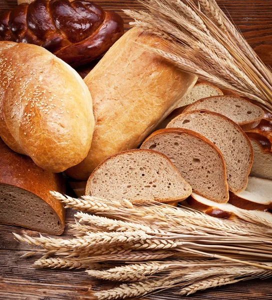 Chléb a pšenice. potraviny pozadí. — Stock fotografie