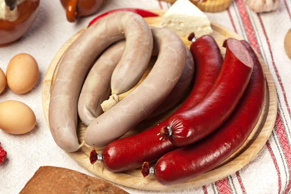 Home-made sausages on the cutting board. — Stock Photo, Image