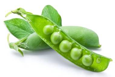 Fresh peas are contained within a pod. clipart