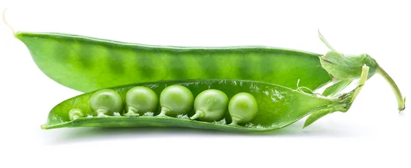 Fresh peas are contained within a pod. — Stock Photo, Image