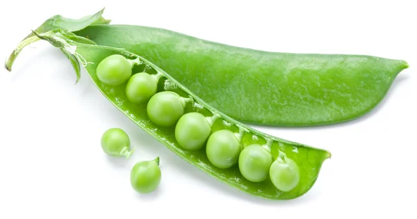 Fresh peas are contained within a pod. — Stock Photo, Image