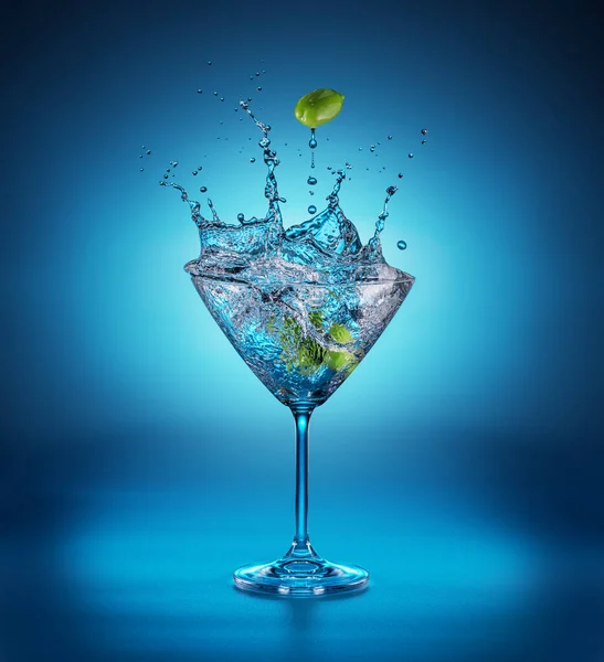 Martini Glass Amazing Splash Result Olive Berries Falling Blue Background — Stock Photo, Image