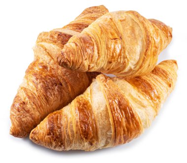 Beyaz arka planda izole edilmiş lezzetli kruvasanlar..