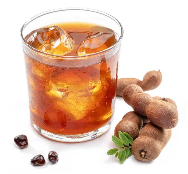 Glass Cool Refreshing Tamarind Drink Some Tamarind Fruit White Background — Stockfoto