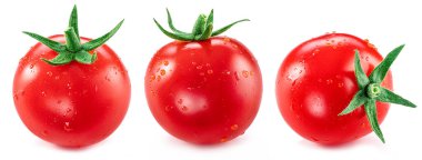 Three cherry tomatoes covered with water drops isolated on white background. Macro shot. 