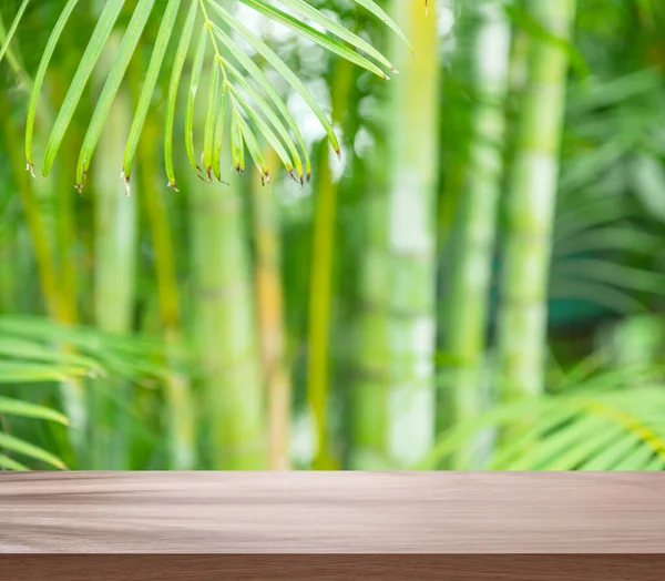 Empty Board Table Top Blurred Green Bamboo Culms Place Your — стоковое фото