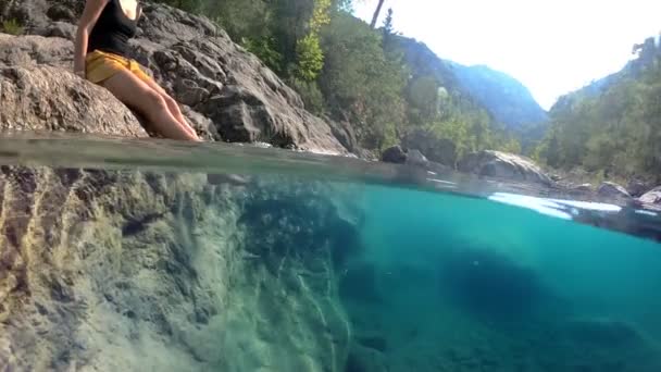 Half Underwater View Beautiful Mountain River Girl Swinging Her Legs — Video Stock
