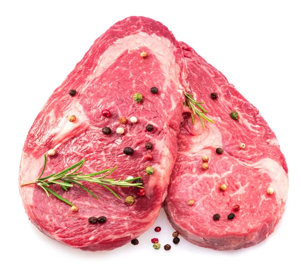 Due Bistecche Fresche Ribeye Con Granturco Pepe Rosmarino Isolate Fondo — Foto Stock