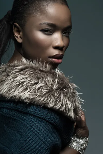 Girl posing in a warm sweater — Stock Photo, Image