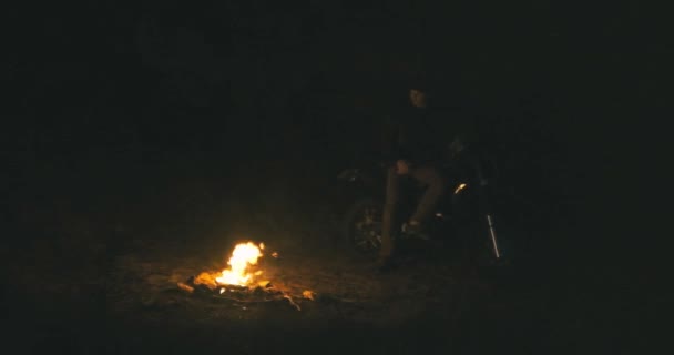 Biker Man Sitting Campfire Drinks Coffee Motorbike Background — Stock Video