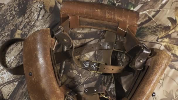 Hand Dropping Shotgun Cartridges Cartridge Belt Camouflaged Surface — Stock Video