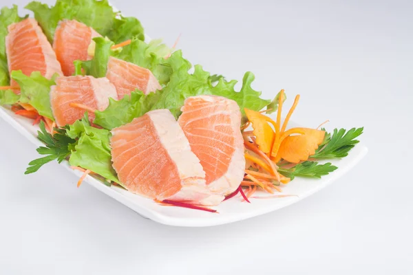 Japanese raw fish with vegetables — Stock Photo, Image