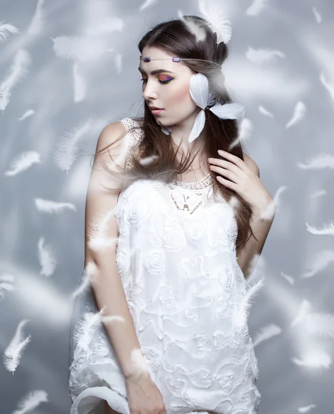 Portrait of a beautiful girl on white background — Stock Photo, Image