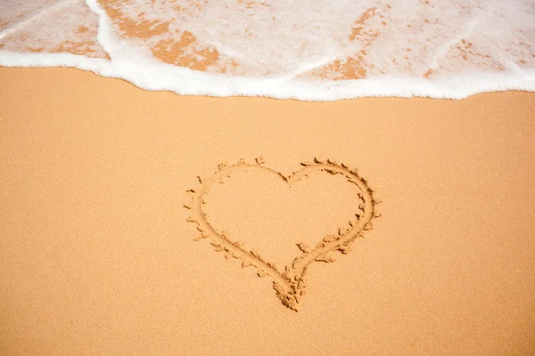 Heart on the sand Stock Photo
