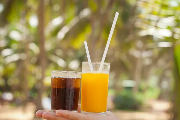 Cocktail and palm trees — Stock Photo, Image