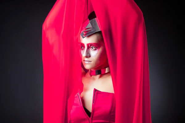 Sexy woman in fluttering red dress — Stock Photo, Image