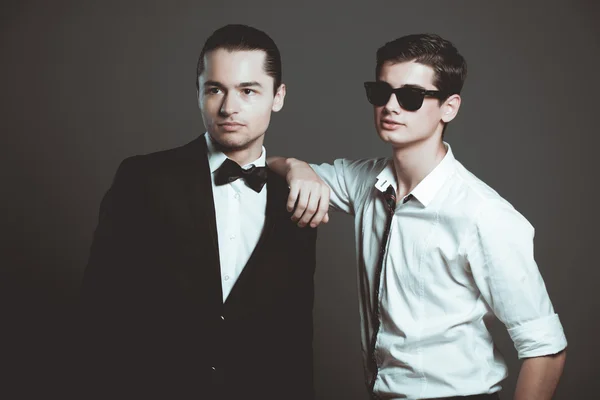 Two stylish men in studio — Stock Photo, Image