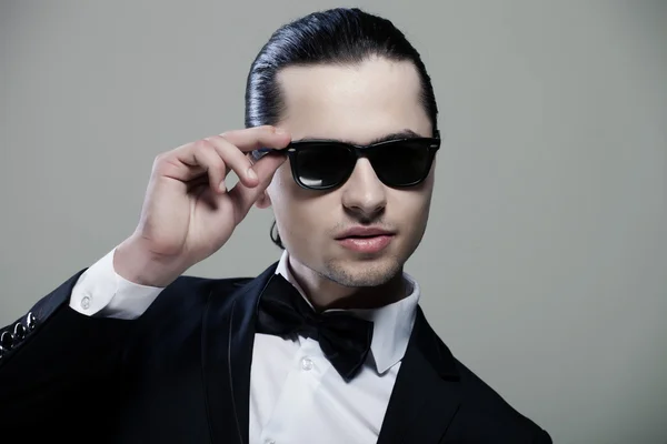 Stylish man in elegant black suit — Stock Photo, Image