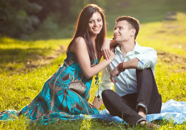 Beautiful couple in park — Stock Photo, Image
