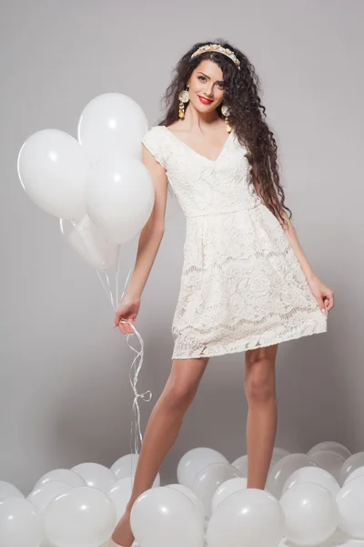 Beautiful young girl in a white dress — Stock Photo, Image