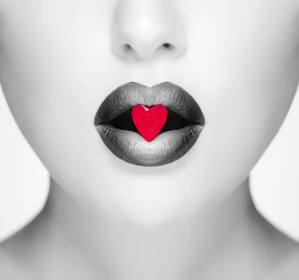 Glamour red lips with ice heart — Stock Photo, Image