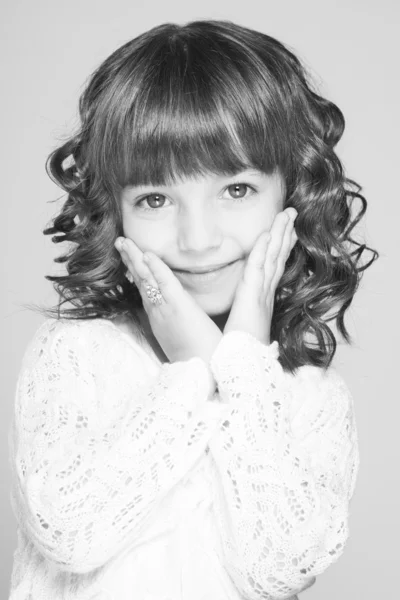 Happy little girl a on white background — Stock Photo, Image