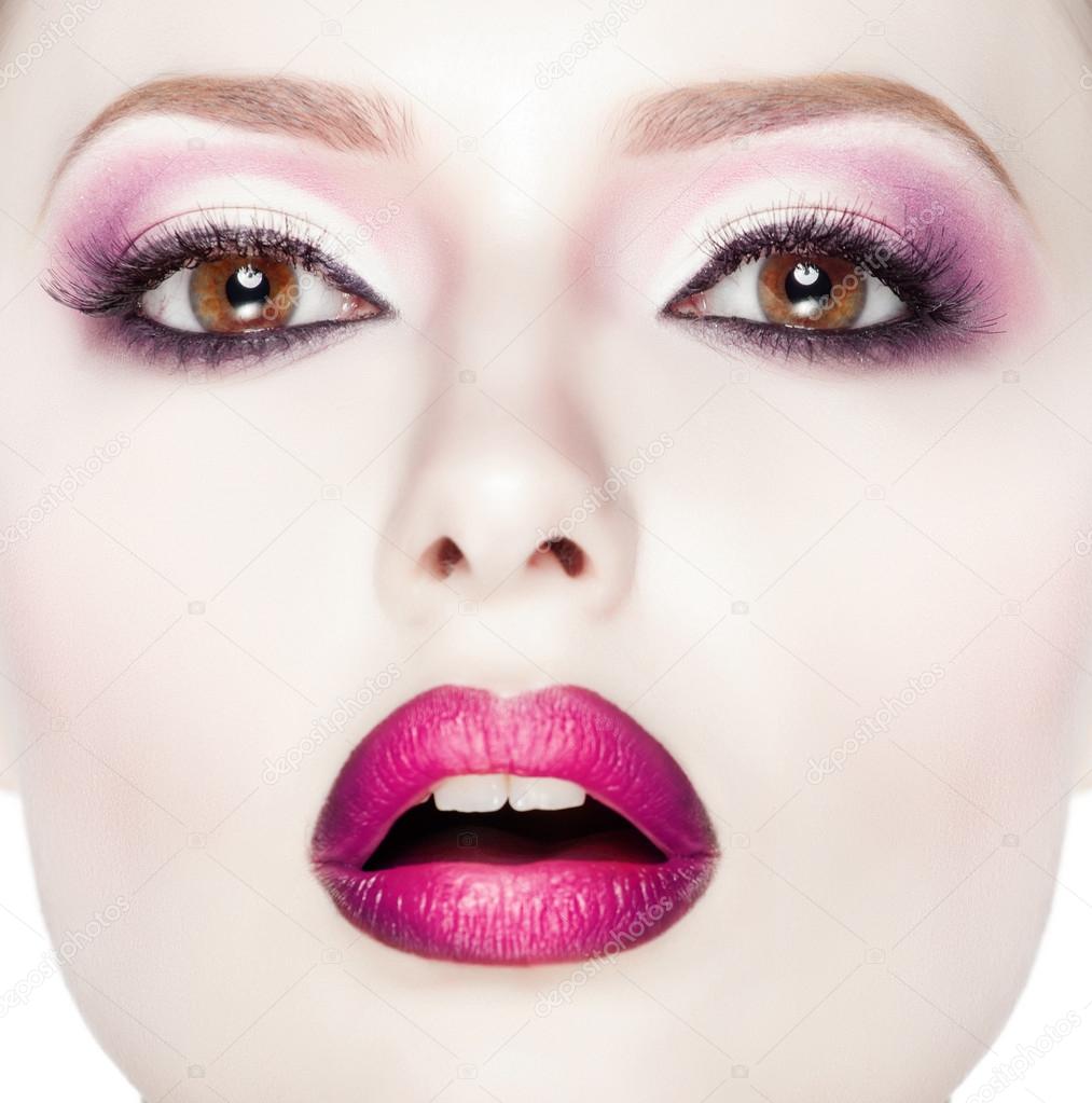 Beauty Fashion Model Girl with pink make-up, close-up studio shoot