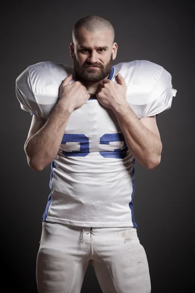 American football player  on the uniform, studio shoot — Stock Photo, Image