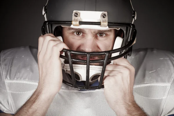 American football player  on the uniform, studio shoot — Stock Photo, Image
