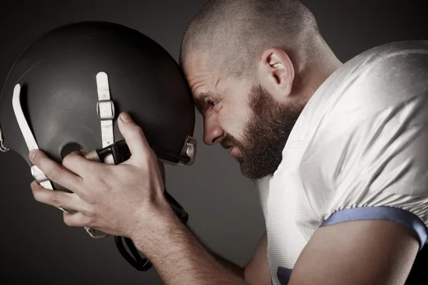 American football player  on the uniform, studio shoot — Stock Photo, Image