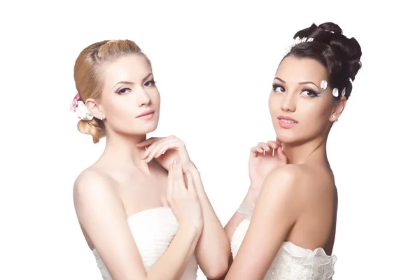 Two beautiful brides with fashion hairstyle and make-up — Stock Photo, Image