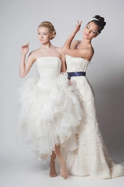 Two beautiful brides with fashion hairstyle and make-up — Stock Photo, Image