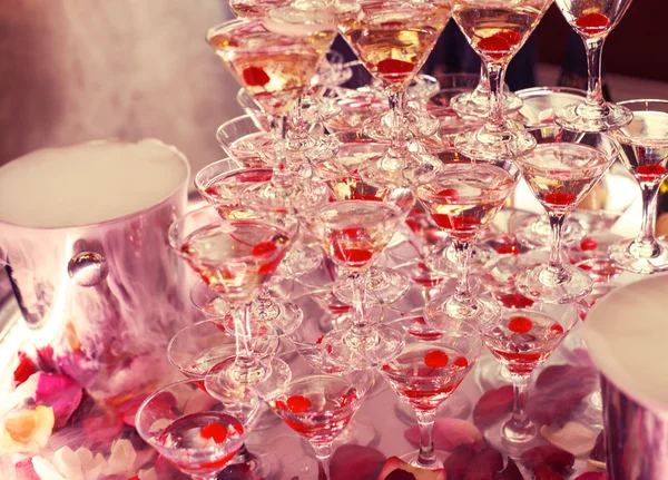 Champagne in glasses with fresh cherry on table - party background — Stock Photo, Image