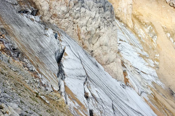 Crack in the glacier on the mountain slope — Stock Photo, Image